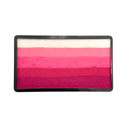 Rectangular one-stroke face paint cake with layered pink tones ranging from white and soft pink to bright magenta and deep berry pink inside a black plastic container on a white background