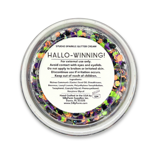 Close-up of Hallo-Winning Halloween Glitter Cream with orange, lime green, purple, black, and iridescent glitter.