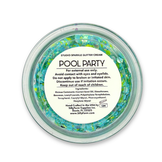 Pool Party Studio Sparkle Glitter Cream (25g) with product label shown on the lid. Handcrafted cosmetic glitter cream by SillyFarm featuring a blue, lime green, and iridescent glitter blend.