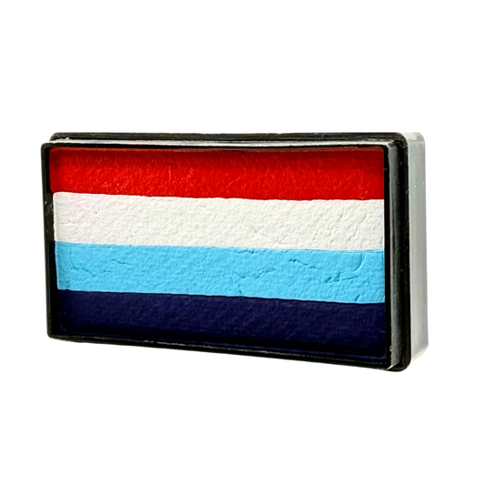 Rectangular one-stroke face paint cake with horizontal stripes of bright red, white, light blue, and deep navy blue inside a black plastic container.