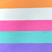 Colorful striped fabric with horizontal stripes in orange, white, pink, blue, and purple.