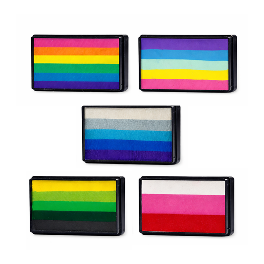 Collection of five Arty Cake one stroke face paints featuring rainbow, pastel rainbow, blue gradient, green gradient, and pink blend color combinations displayed in rectangular face paint cakes.