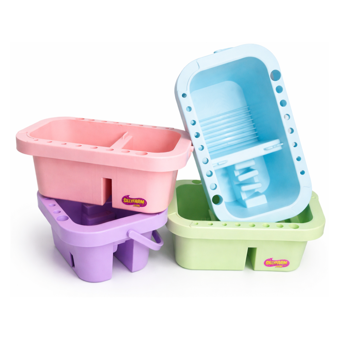 Set of colorful plastic brush tubs on a white background