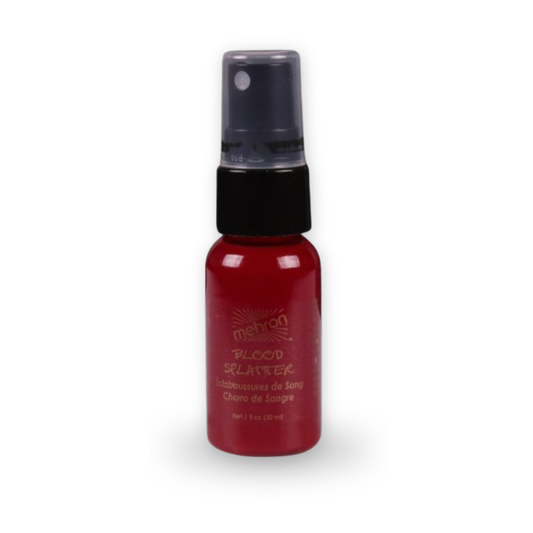 A small red spray bottle of Mehron Blood Slayer special effects makeup on a white background.