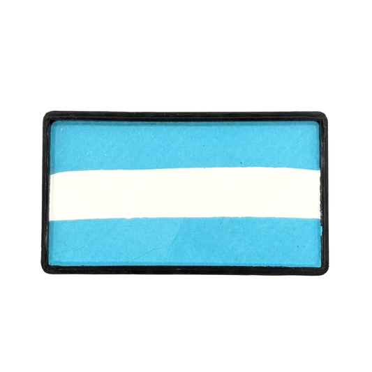 Rectangular one-stroke face paint cake with sky blue and white horizontal stripes inside a black plastic container, inspired by the colors of the Argentina flag for soccer fan face painting and cheek flags.