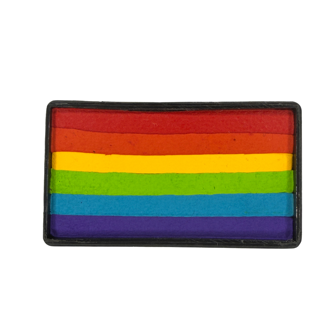 Close-up of a rectangular Rainbow Cake one-stroke face paint in a black container, featuring six horizontal color bands: red, orange, yellow, lime green, sky blue, and purple. The water-activated face paint is designed for fast one-stroke designs, rainbow face painting, fantasy makeup, floral designs, and colorful body art.