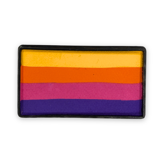 Lotus Arty Cake 28g one-stroke face paint featuring five layered shades of yellow, orange, pink, and purple in a rectangular cake for creating vibrant floral, butterfly, sunset, and fantasy face painting designs.