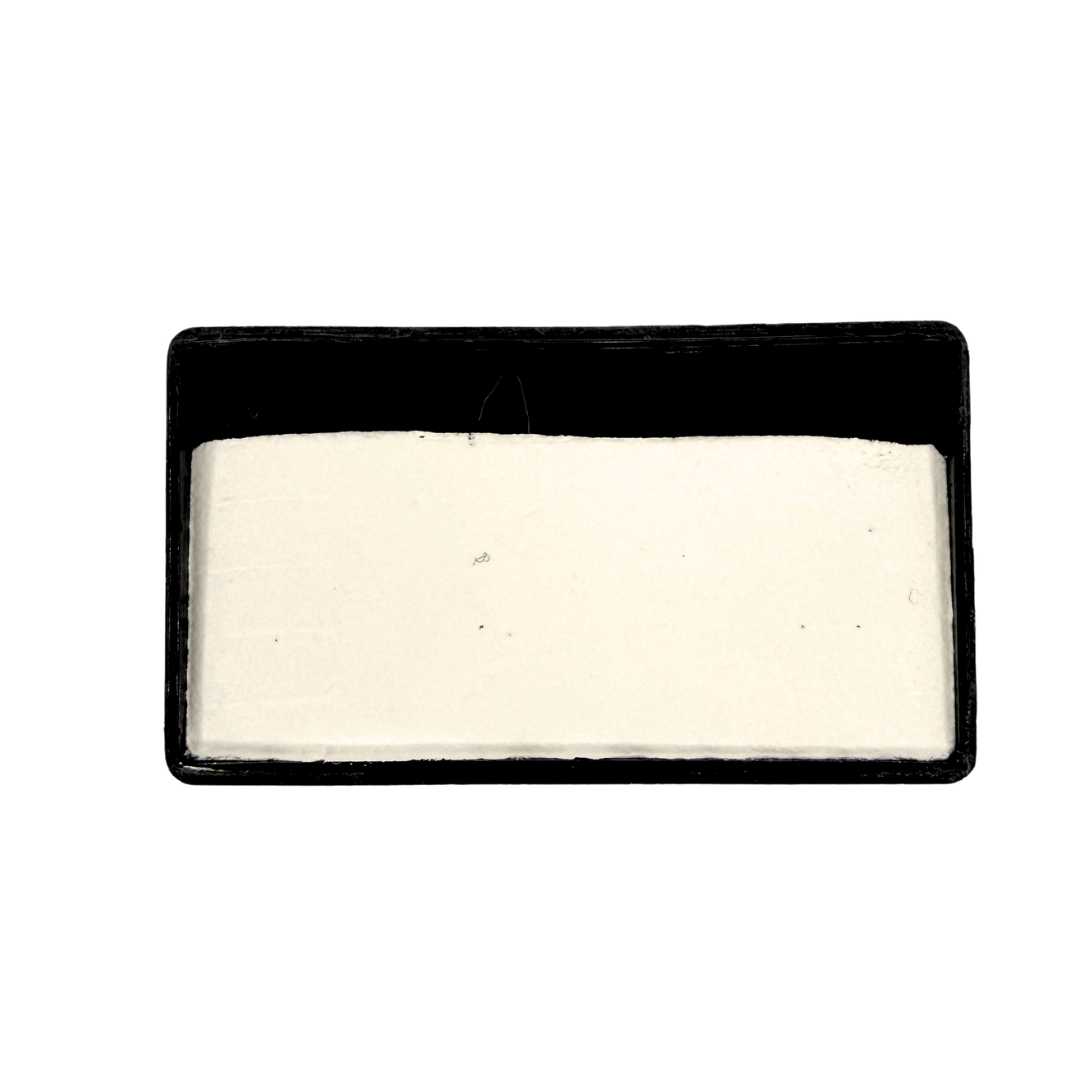 Peekaboo Black Arty Cake 28g one-stroke face paint featuring a large white section with a black edge for ghosts, skulls, snowmen, teeth, characters, and outlined face paint designs.
