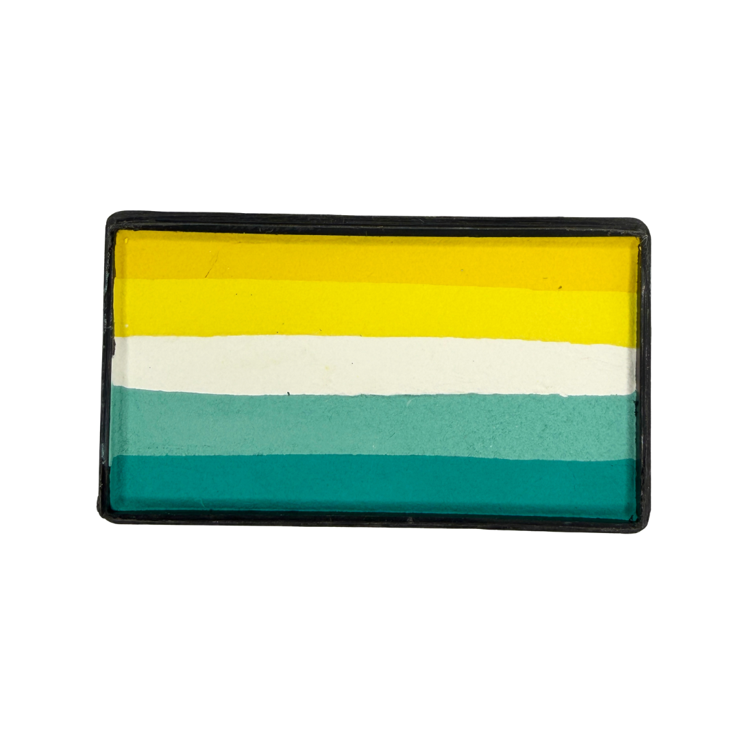 Sunday Vibes Arty Cake 28g one-stroke face paint featuring layered yellow, white, aqua, and teal colors in a rectangular cake.