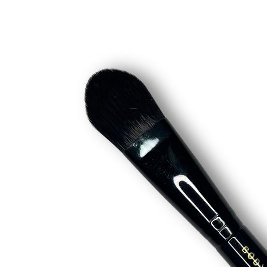 Close up of Body Color Cosmetics Face Base Stiletto face painting brush with rounded black synthetic bristles designed for base color application and smooth coverage.