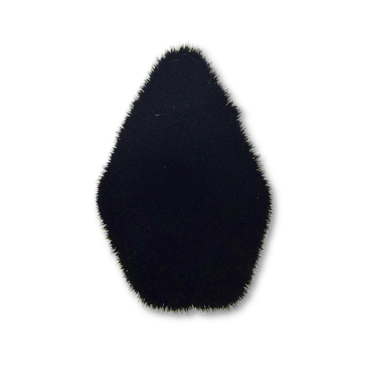 Close-up of the coffin-shaped black synthetic bristles on the BCC Stiletto Coffin Kabuki Brush.