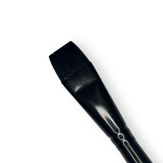 Close up of Body Color Cosmetics Stiletto ¾ inch flat face painting brush with black synthetic bristles designed for one-stroke face paint designs.