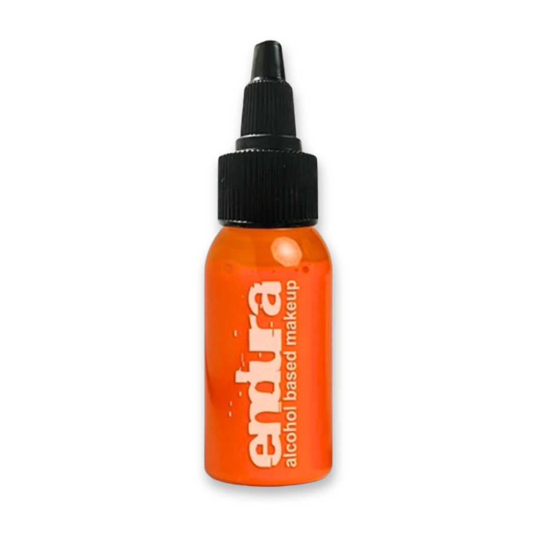 An orange bottle of extra alcohol based makeup with a black dropper cap, shown on a plain white background.