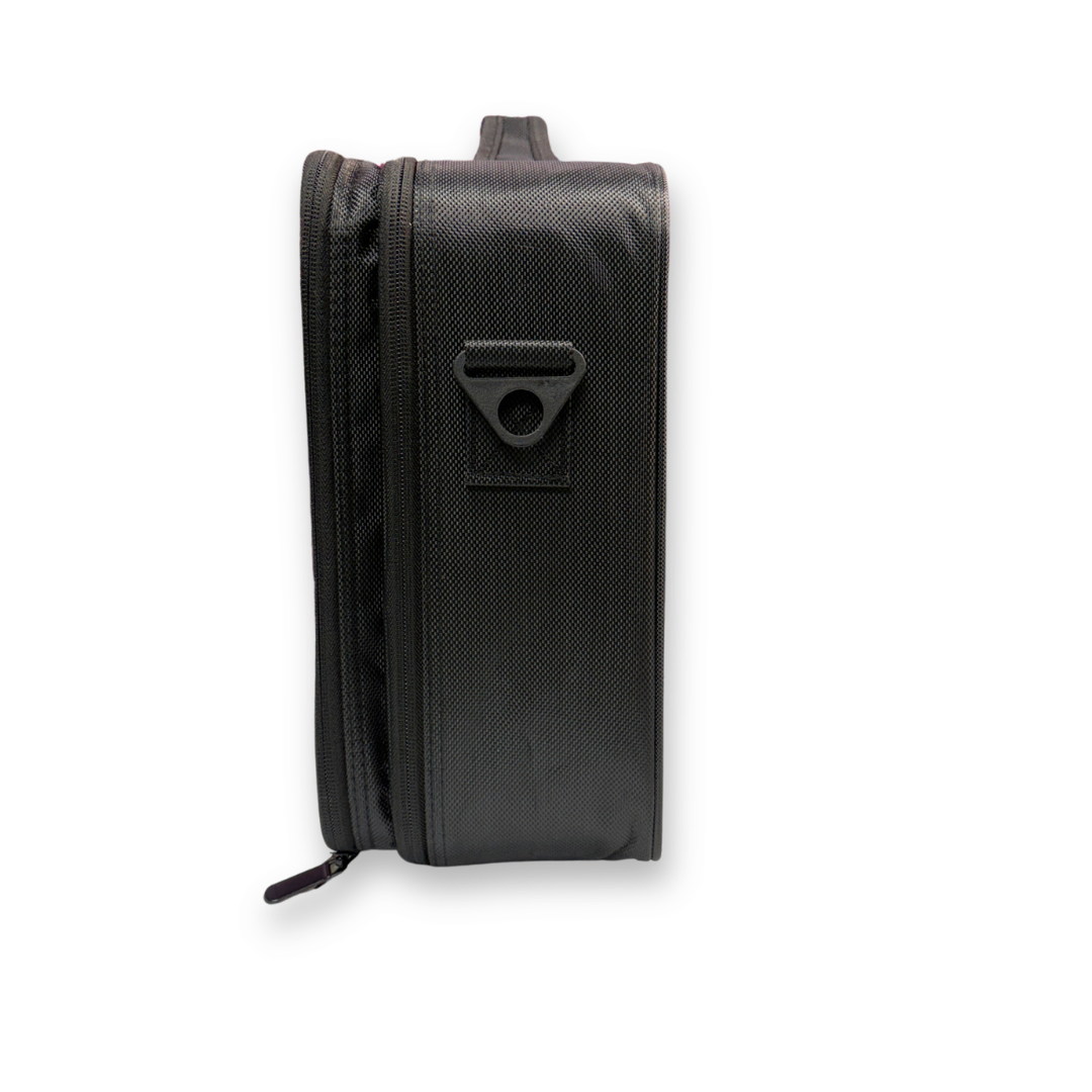 Side profile of the SillyFarm Face Paint N' Go Case showing its slim design and shoulder strap attachment.