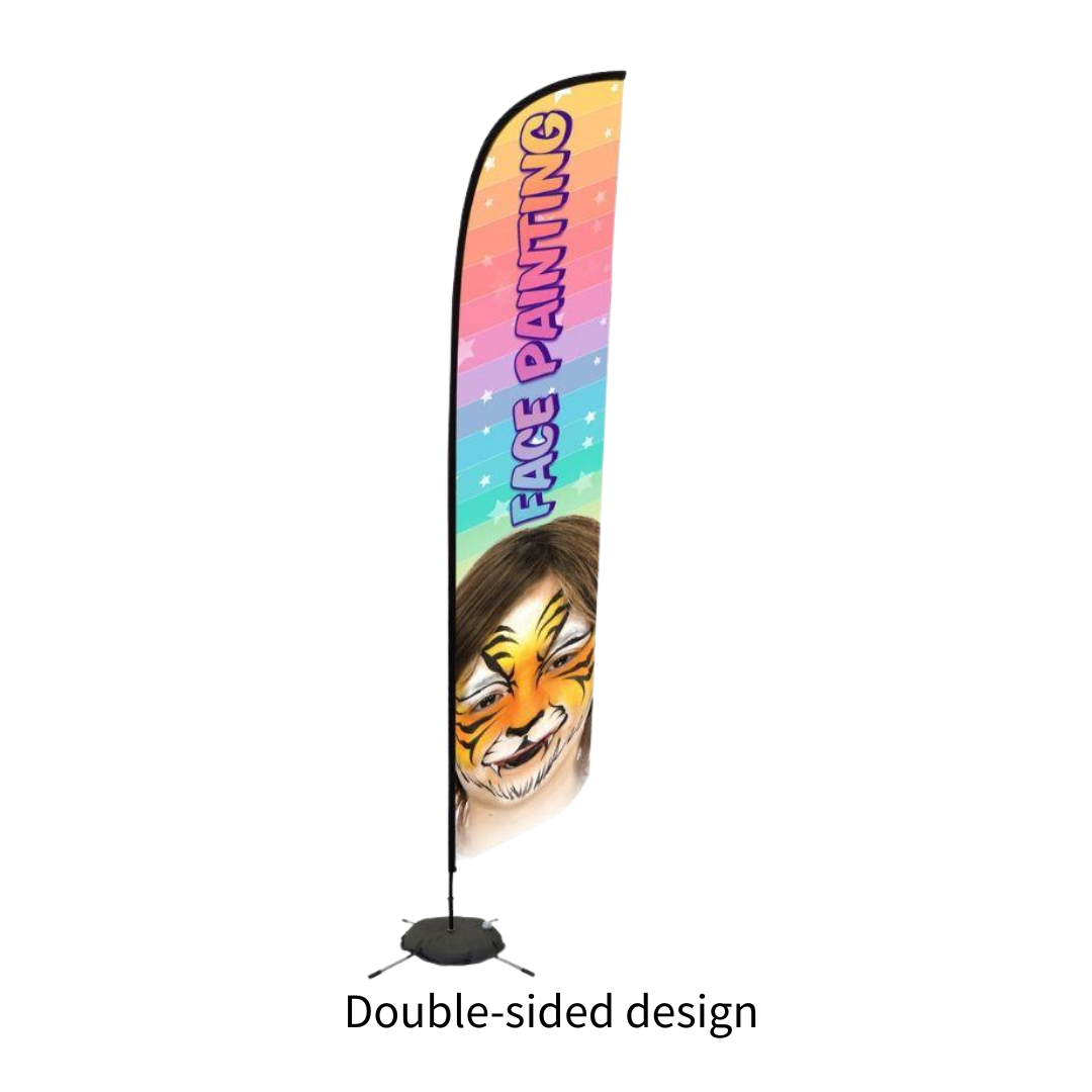 A tall feather-style promotional flag on a stand with a black base, shown on a plain white background. The flag has a rainbow gradient and the words “FACE PAINTING” printed vertically, with an illustrated face painted in orange and yellow near the bottom.