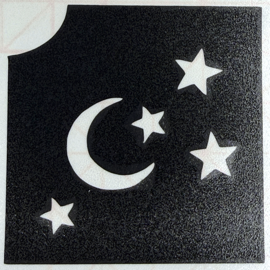 Moon and stars glitter tattoo stencil featuring a crescent moon and four stars on a professional self-adhesive 2-inch stencil.