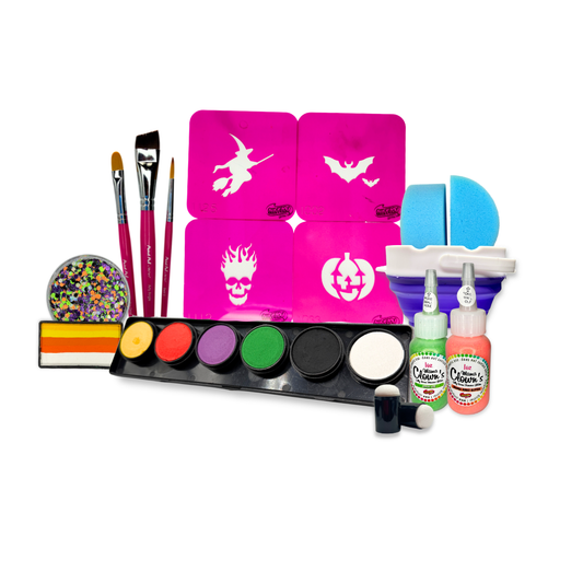 Halloween face paint kit with stencils, face paints, brushes, sponges, and bottles of face paint on a white background.