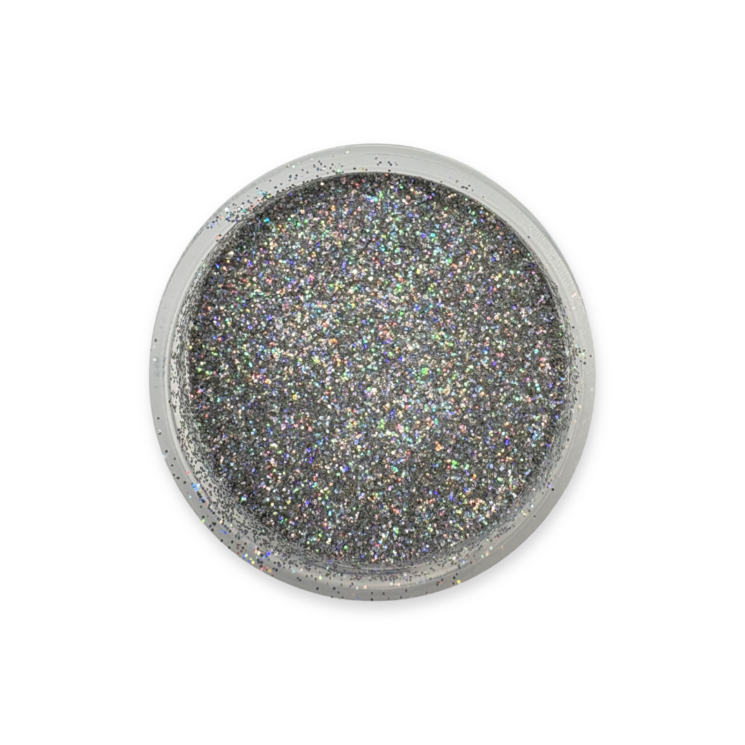 Round metallic object with glittery texture on a white background