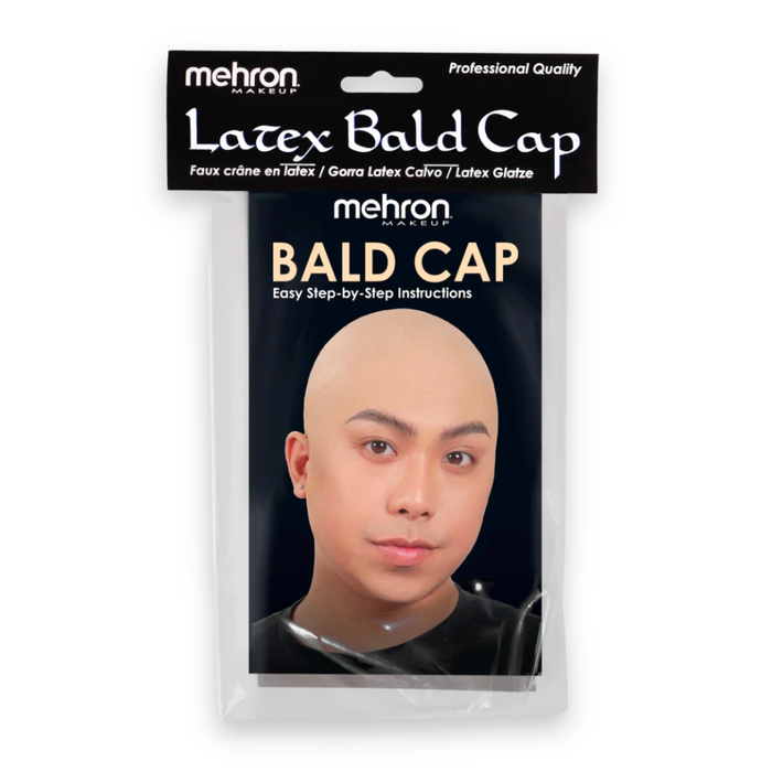 Mehron Makeup Latex Bald Cap in its retail packaging, featuring a black header card with white and gold text and a photo of a bald man on the front.