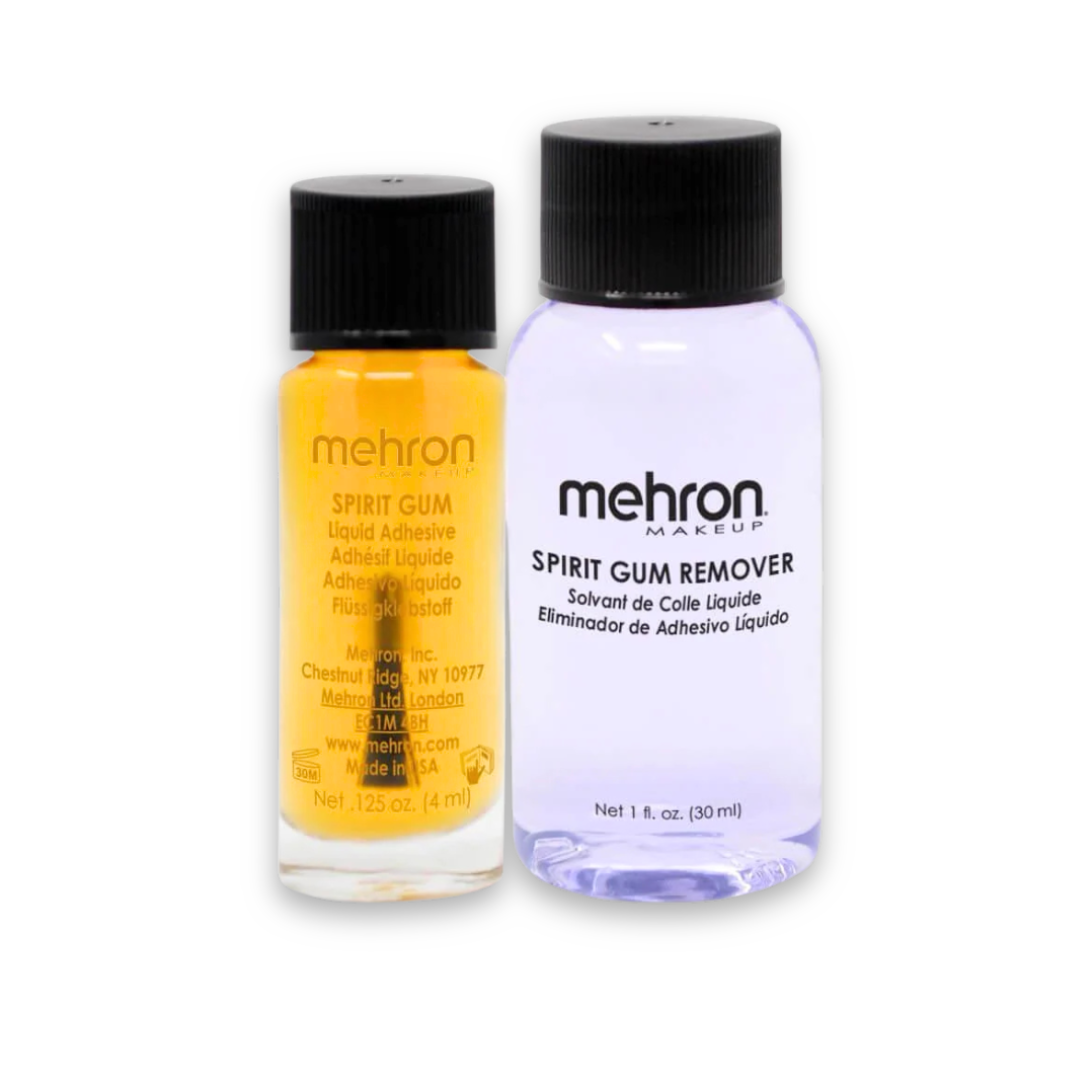 Two small bottles from Mehron Makeup on a white background: a Spirit Gum basic adhesive liquid in amber-yellow with a black cap, and a Spirit Gum Remover in translucent bottle with a black cap.