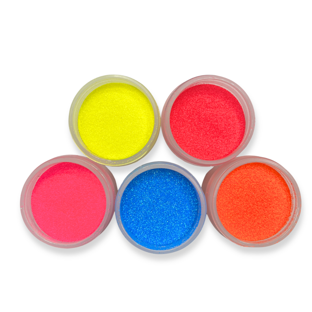 Five small containers of colorful neon glitter in jar containers on a white background
