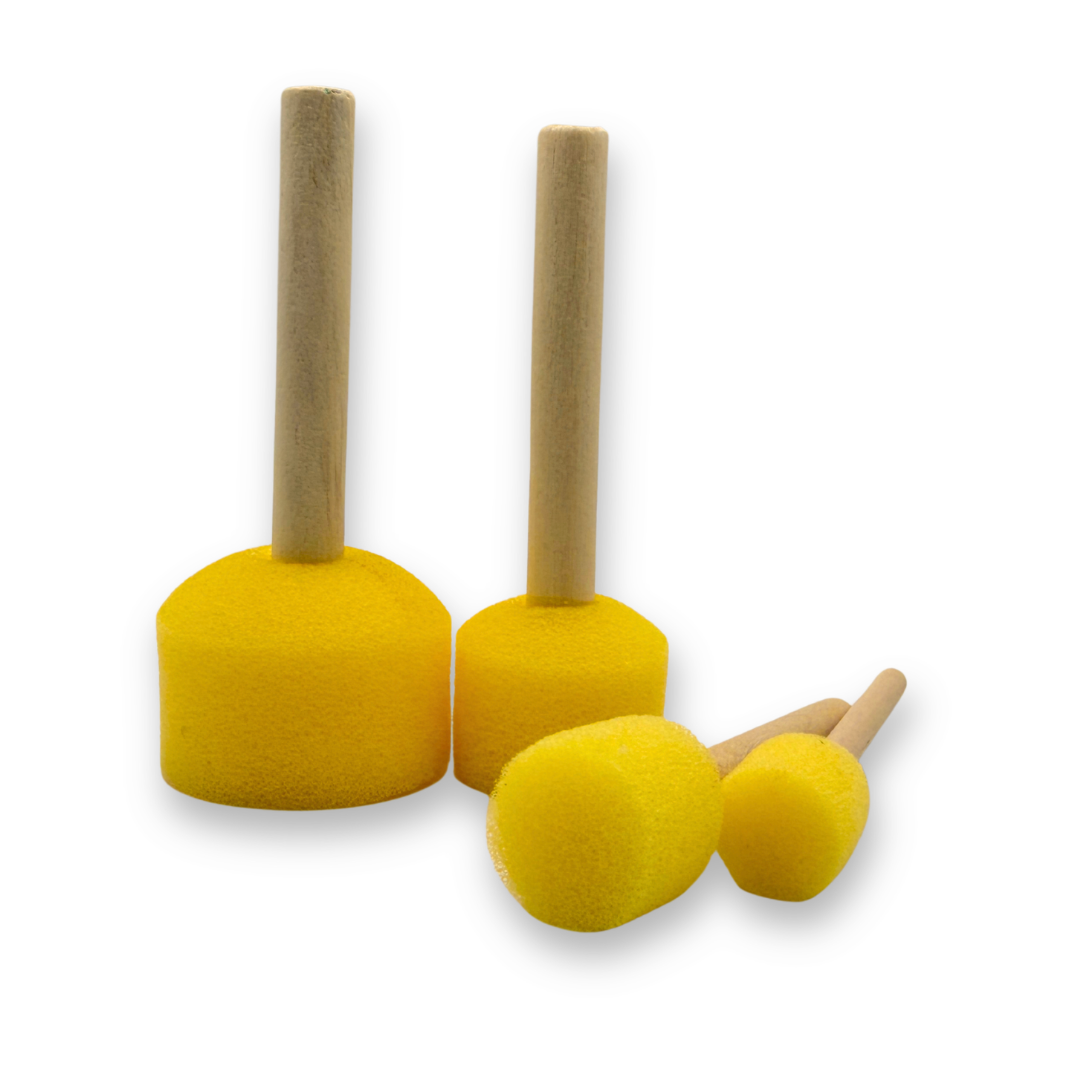 Set of four yellow round foam pouncers with natural wooden handles in assorted sizes, displayed upright and lying down on a white background. These face painting applicators are ideal for creating smooth circles, dots, and blended designs.