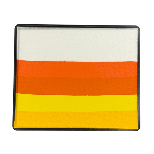 Halloween Rainbow Cake face paint with layered stripes of white, bright orange, orange, yellow, and golden yellow in a rectangular container.