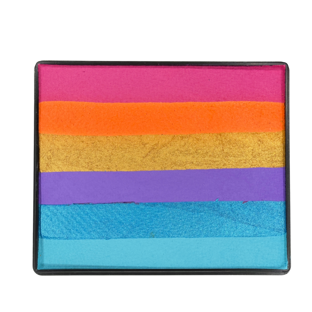 Image of a Rainbow Face Paint Cake featuring a palette of bright colors arranged in stripes. Designed for easy application, this face paint allows artists to create bold, blended, multi-color designs with a single swipe. Ideal for a variety of themes and festive occasions.