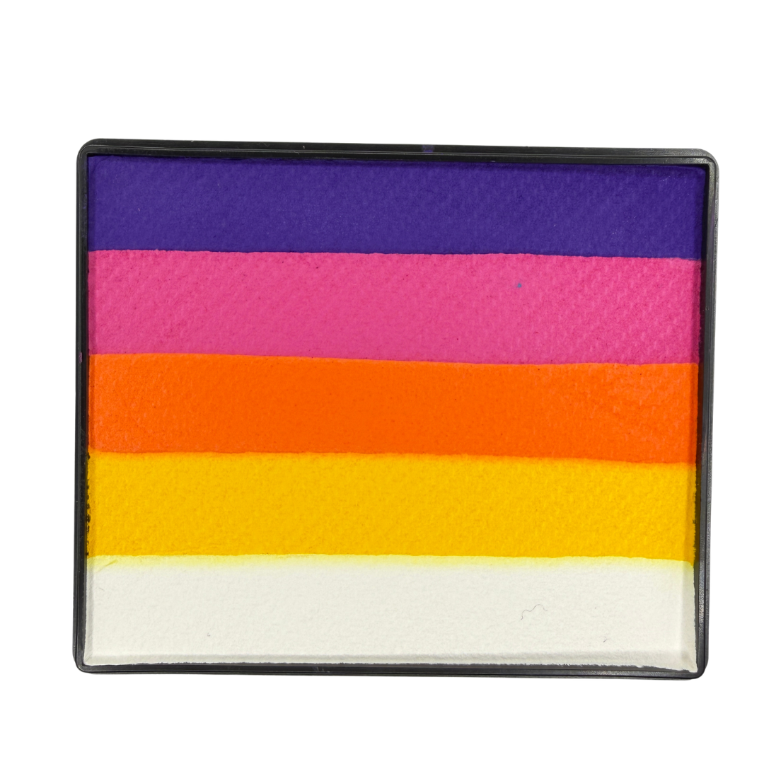 Image of a Rainbow Face Paint Cake featuring a palette of bright colors arranged in stripes. Designed for easy application, this face paint allows artists to create bold, blended, multi-color designs with a single swipe. Ideal for a variety of themes and festive occasions.