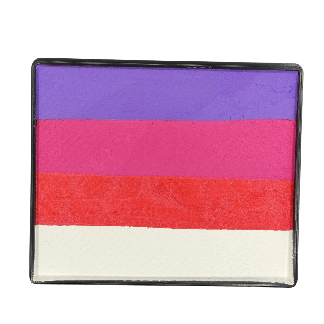 Image of a Rainbow Face Paint Cake featuring a palette of bright colors arranged in stripes. Designed for easy application, this face paint allows artists to create bold, blended, multi-color designs with a single swipe. Ideal for a variety of themes and festive occasions.