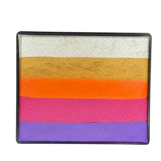 Image of a Rainbow Face Paint Cake featuring a palette of bright colors arranged in stripes. Designed for easy application, this face paint allows artists to create bold, blended, multi-color designs with a single swipe. Ideal for a variety of themes and festive occasions.