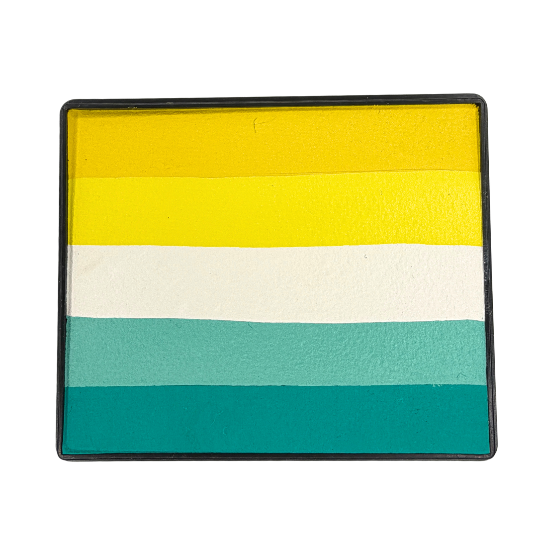 Sunday Vibes Rainbow Cake face paint with horizontal stripes of golden yellow, bright yellow, white, light aqua, and teal in a black rectangular container.