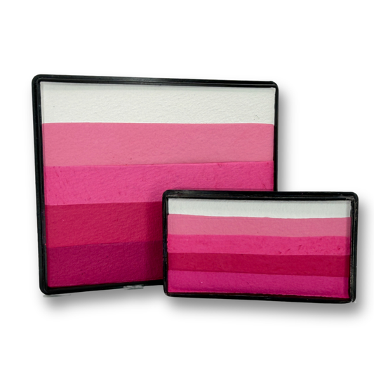 Pinky Winky Rainbow Cake and matching Arty Cake featuring five coordinated shades of white, light pink, hot pink, magenta, and berry face paint displayed together as a one-stroke face paint bundle.