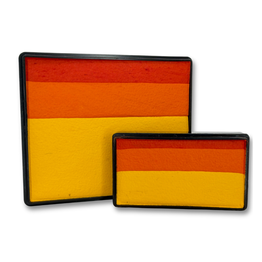 Silly Tiger Rainbow Cake and Baby Silly Tiger Arty Cake face paint set featuring layered golden yellow, orange and deep orange colors.