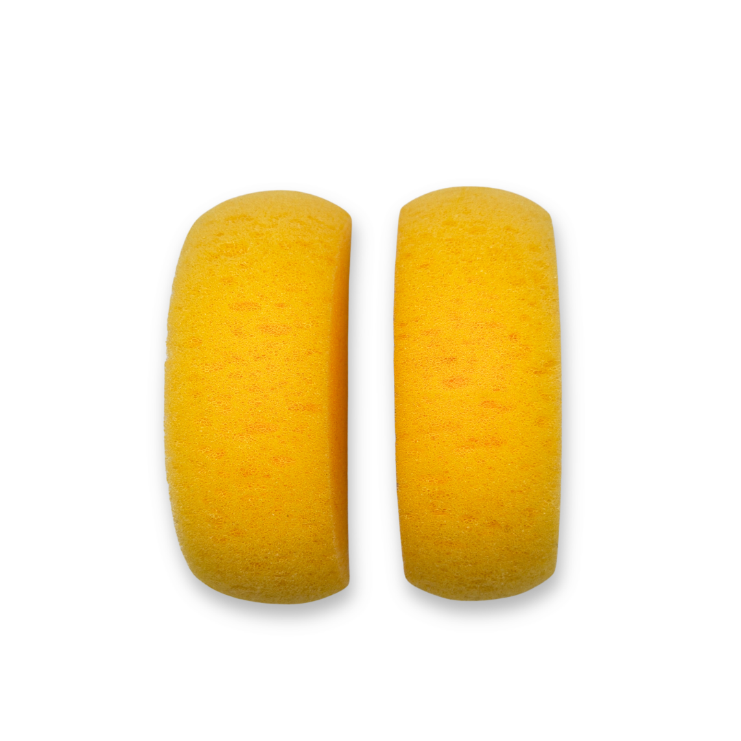 Two yellow SillyFarm Classic Face Painting Sponges shown standing upright side by side, featuring a curved half-moon shape designed for smooth face paint application, blending, and loading rainbow cakes.