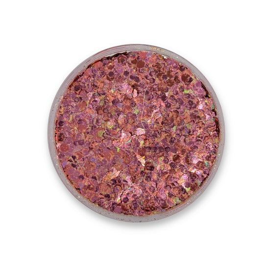 Open jar of Chateau Silly Studio Sparkle Glitter Cream showing chunky rose pink, mauve, and iridescent cosmetic glitter mix.