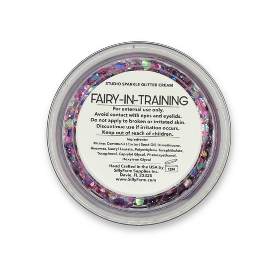 Back view of Fairy-In-Training Studio Sparkle Glitter Cream container showing the product label, ingredients, safety information, and usage details. ✨