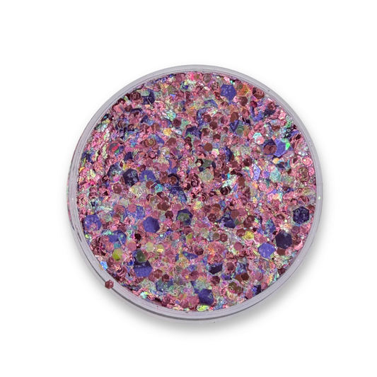 Open jar of Fairy-In-Training Studio Sparkle Glitter Cream showing chunky pink, purple, and iridescent cosmetic glitter mix with rainbow reflections.