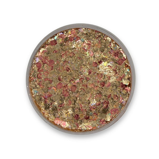 Open jar of Let's Toast Studio Sparkle Glitter Cream showing chunky gold, champagne, rose gold, and iridescent cosmetic glitter mix.