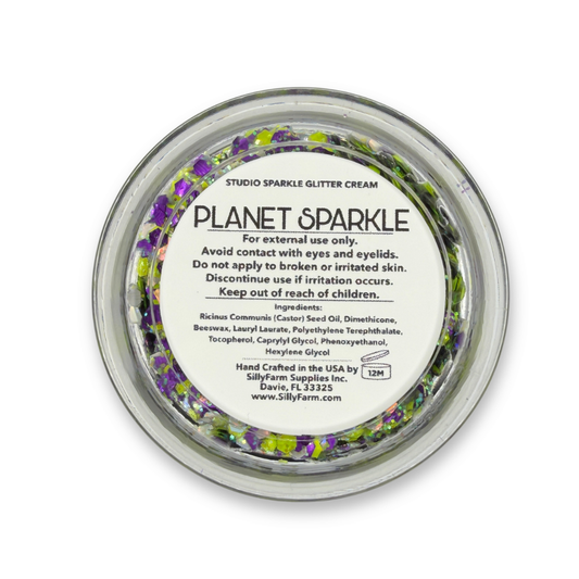 Back view of Planet Sparkle Studio Sparkle Glitter Cream container showing the product label, ingredients, safety information, and usage details.