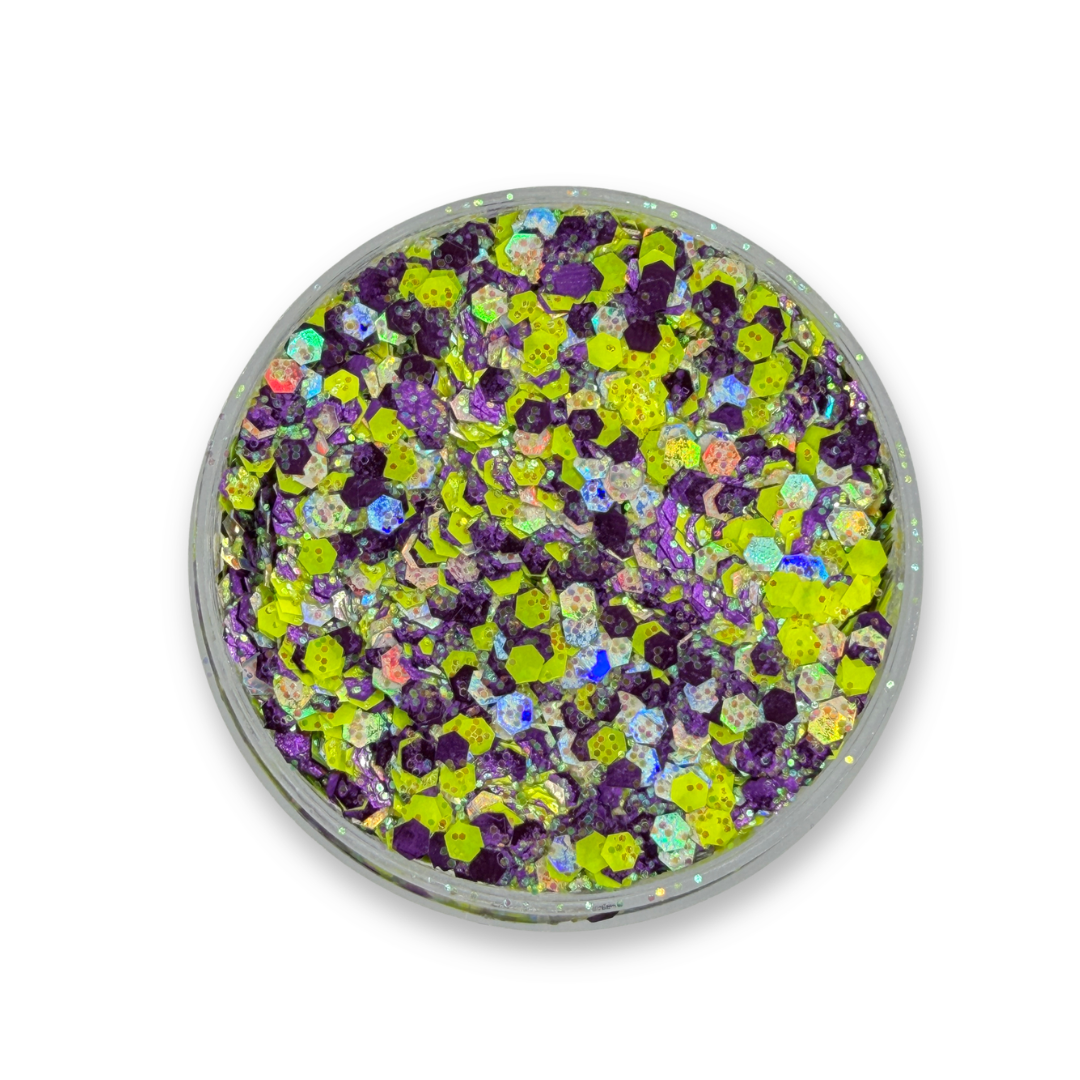 Open jar of Planet Sparkle Studio Sparkle Glitter Cream showing chunky lime green, purple, iridescent silver, and holographic cosmetic glitter mix.