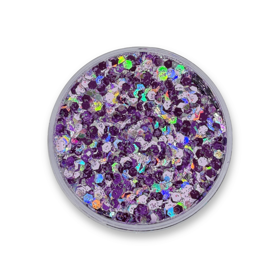 Open jar of The Grape Gatsby Studio Sparkle Glitter Cream showing chunky purple, lavender, iridescent silver, and holographic cosmetic glitter mix.