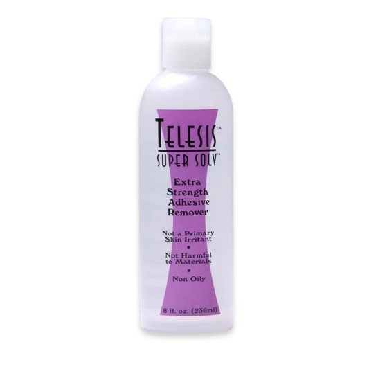 Telesis Super Solv extra-strength professional adhesive and prosthetic remover in white bottle with purple label.