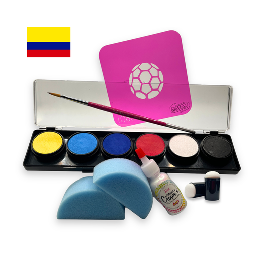 Colombia/Ecuador-themed soccer fan face paint kit featuring a 6-color water activated palette with yellow, blue, red, white, and black paints, a pink soccer stencil, professional round brush, two blue face painting sponges, a bottle of Mama Clown glitter, and foam daubers displayed on a white background.