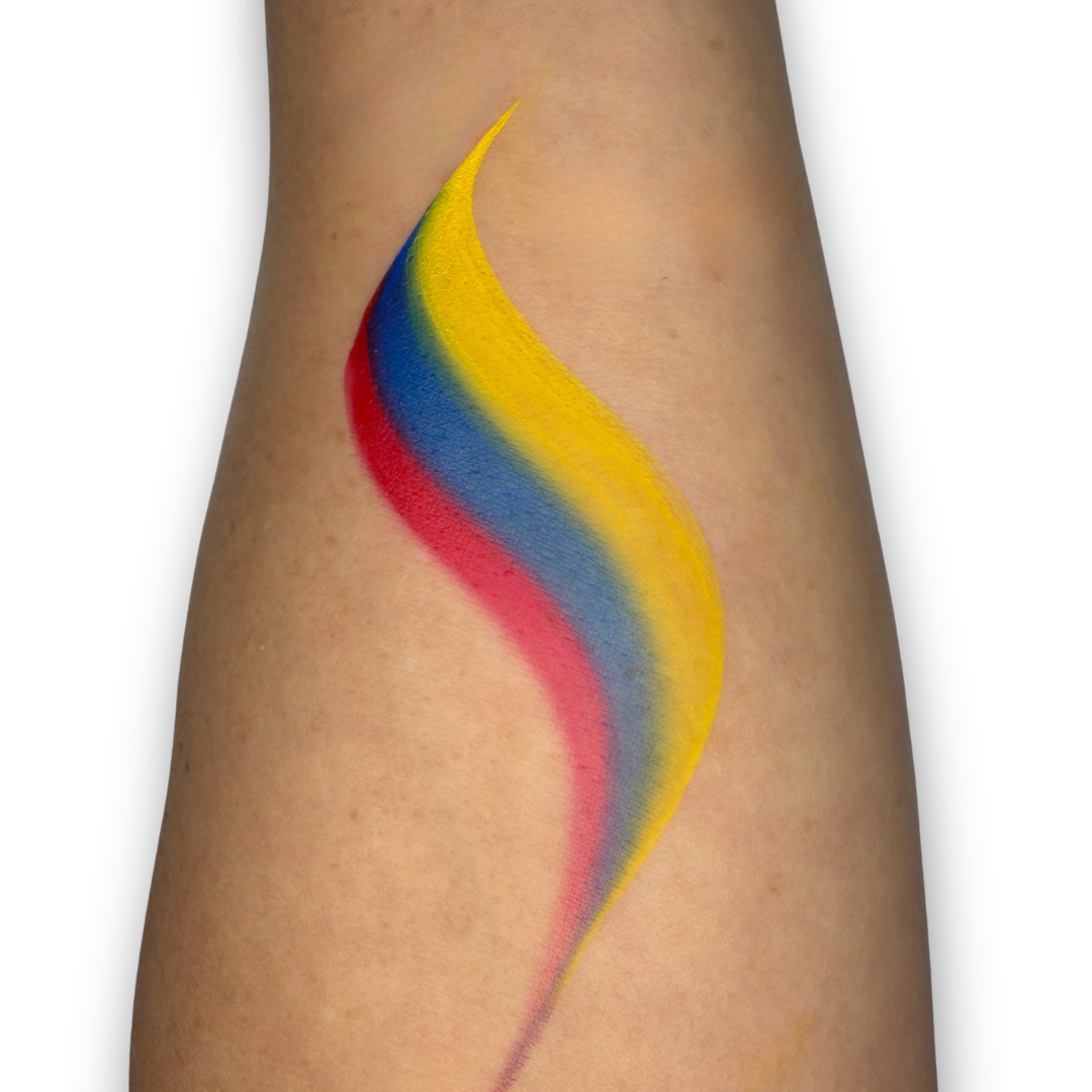 Yellow, blue, and red one-stroke face paint swatch with bold blended stripes, inspired by Colombia's national colors for world soccer fan face painting.
