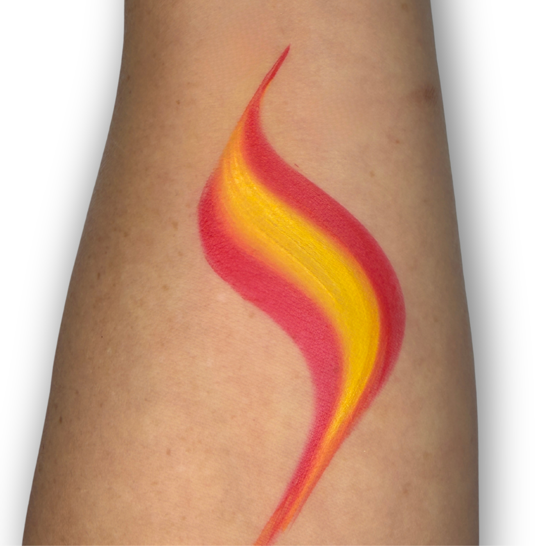 Red and yellow one-stroke swatch created with the Spain Flag Arty Cake, demonstrating smooth blended stripes and crisp tapered edges for fast flame designs with a single brush stroke.