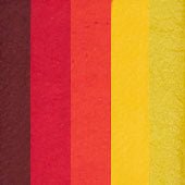 Compact, multi-color face paint cakes for brush application, ideal for vibrant, detailed designs in one stroke.