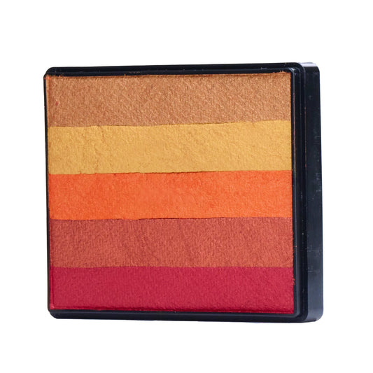 Image of a Rainbow Face Paint Cake featuring a palette of bright colors arranged in stripes. Designed for easy application, this face paint allows artists to create bold, blended, multi-color designs with a single swipe. Ideal for a variety of themes and festive occasions.