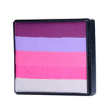 Image of a Rainbow Face Paint Cake featuring a palette of bright colors arranged in stripes. Designed for easy application, this face paint allows artists to create bold, blended, multi-color designs with a single swipe. Ideal for a variety of themes and festive occasions.