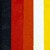 Compact, multi-color face paint cakes for brush application, ideal for vibrant, detailed designs in one stroke.